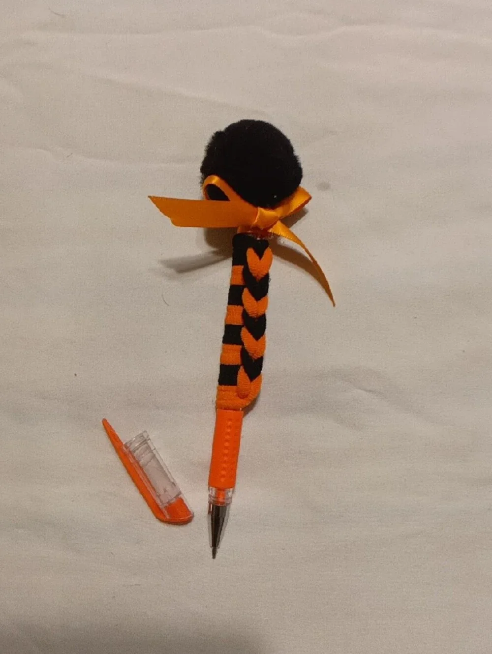 Girls Orange & Black Pom Headband and Pom Pom pen set